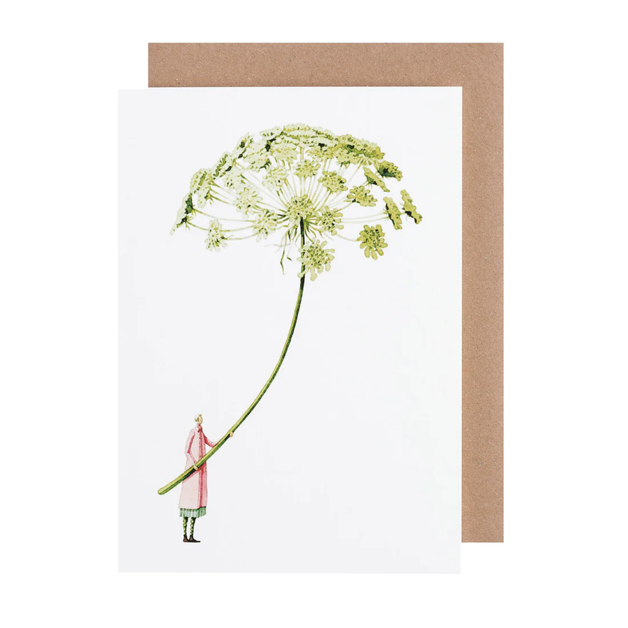White card with watercolor painting of a small woman holding an oversized ammi flower.