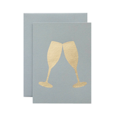 Card with gold champagne glasses on a light grey background