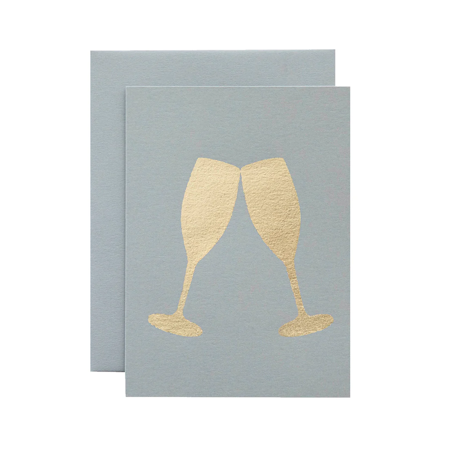 Card with gold champagne glasses on a light grey background