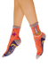 Orange blue and beige color block socks with a sea-goat. "Capricorn" is written underneath the sea-goat, with celestial elements around the socks.