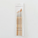 Set of paintbrushes in a clear packaging on a white background.