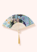 Ornate floral-patterned hand fan with a gold tassel on a white background.