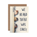 Greeting card with dogs peeking around a door and text "We heard there was cake!" on a white background.