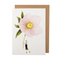 White card with a watercolor painting of a small man carrying an oversized light pink hellebore. 