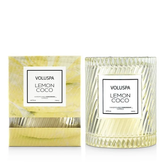 Candle and candle box against a white background.