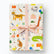 A gift-wrapped rectangular package tied with a pale pink ribbon and bow, covered in a whimsical safari-themed print with an orange tiger, giraffe, crocodile, flamingo, bird, elephant, cat, and gift boxes on an off-white background.