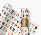 Wrapping paper sheets with a gallery of illustrated dogs, against a white background.