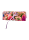 Rolled up pink jewelry roll with a floral pattern in pink, purple and reens, tied with a lavender ribbon.