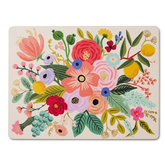 Corkboard placemat with floral pattern against white background.