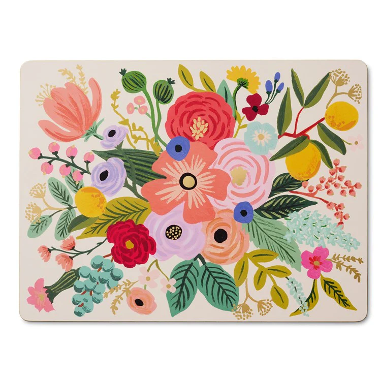 Corkboard placemat with floral pattern against white background.