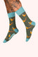 Pair of dark olive socks with light blue trim, and a repeating pheasant pattern.