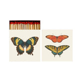 An open matchbook with illustrations of different varieties of butterflies and matches with red heads poking out of the top. 