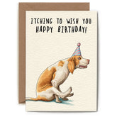 A greeting card with an illustration of a tan and white dog wearing a party hat, scooting its backend on the floor. 
the text reads "Itching to wish you a happy birthday!"