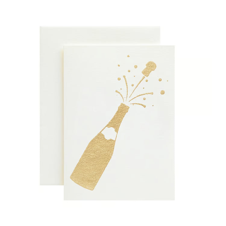 Ivory greeting card with a gold foil cutout of a champagne bottle popping.