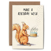 Greeting card with an illustration of a squirrel holding a cake with dandelions in place of candles. The text on the card reads "Make a birthday wish!"