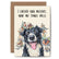 A greeting card with an illustration of a  black and white dog in front of a bunch of presents unwrapped. The text reads "I checked your presents, none are tennis balls!"