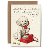 A greeting card with an illustration of a small white dog talking on a red rotary phone. A treat sits broken in half next to the dog, and the text on the card reads "Police? Yes, my owner broke a treat in half and said it was two treats."