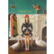 A painting of a woman sitting in a chair in front of a wall that is half turquoise, half white paneling on the bottom. She sits next to a clothes rack, and a duck and swan sit on either side of her. Gold cursive text at the top of the painting reads "I like your style".
