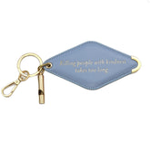 A powder blue diamond-shaped leather keychain with a brass key ring, split ring, and whistle. Engraved on the keychain is the phrase "Killing people with kindness takes too long."