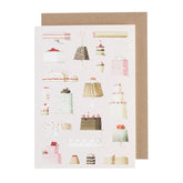 Light pink greeting card with watercolor paintings of different cakes and cake slices.