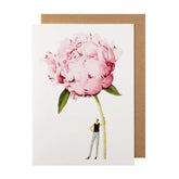 White card with a watercolor painting of a small man holding an oversized pink peony.