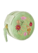 A light green velvet round jewelry box with embroidered flowers, a bee, and the word 'LOVE' on the front, featuring a side strap and a gold zipper.