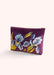 A deep grape purple colored velvet zip pouch, with blue iris flowers embroidered onto it, against a white background.