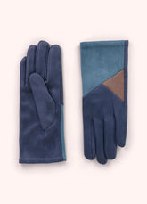 A pair of velvet gloves with a blue and tan geometric design on them.