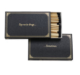 A black matchbook with the saying "Say no to drugs...sometimes."