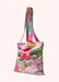 A colorful floral print fabric tote bag, shown against a white background.