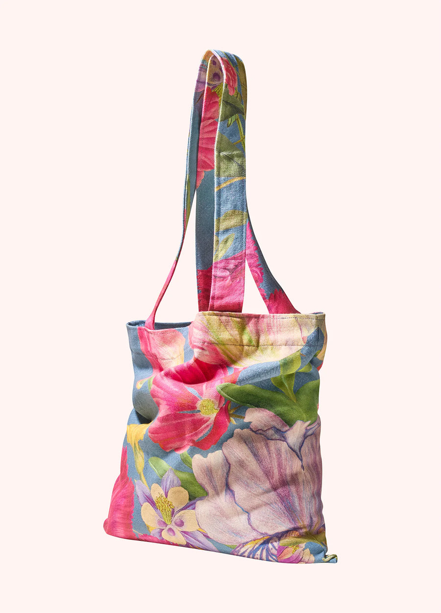 A colorful floral print fabric tote bag, shown against a white background.