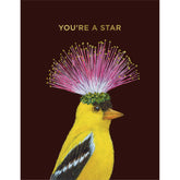 A black card with a painting of a yellow bird with a bright pink flower on its head. Gold text above it reads "You're a star".